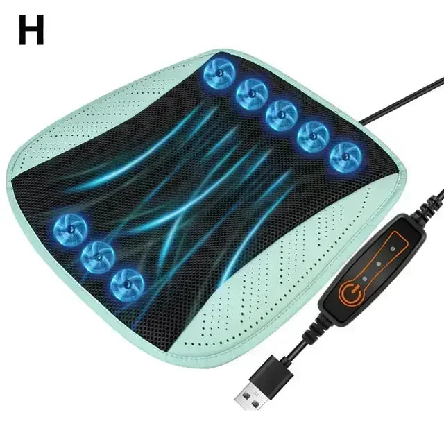 Massage pillow with LED lights and USB cable on a white background